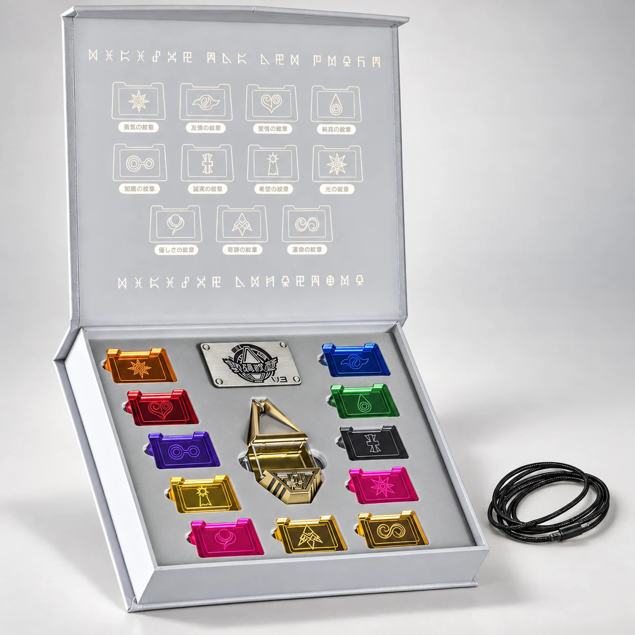 The complete Digimon crest collection: eleven crest plates, gold-tone tag, cord and presentation box