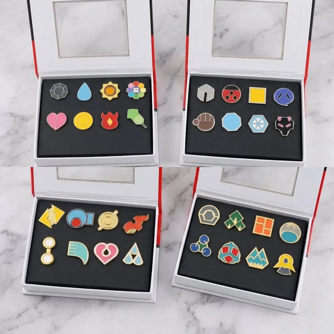All four gift boxes open on marble: Kanto and Johto on top, Hoenn and Sinnoh below, eight badges in each